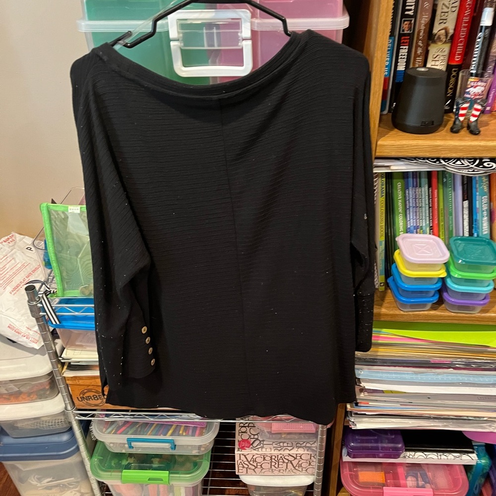 Long sleeves with buttons on the sleeves to dress it up